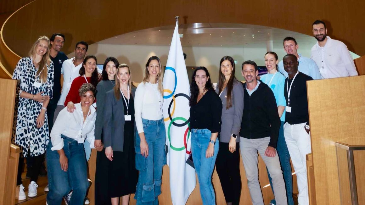 BEYOND THE COURT OLYMPIANS SIGN OLYMPIC WALL