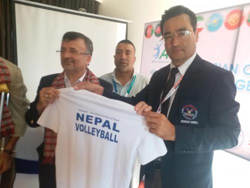 NVA General Secretary presenting Tshirt to Dr. Dawarzani